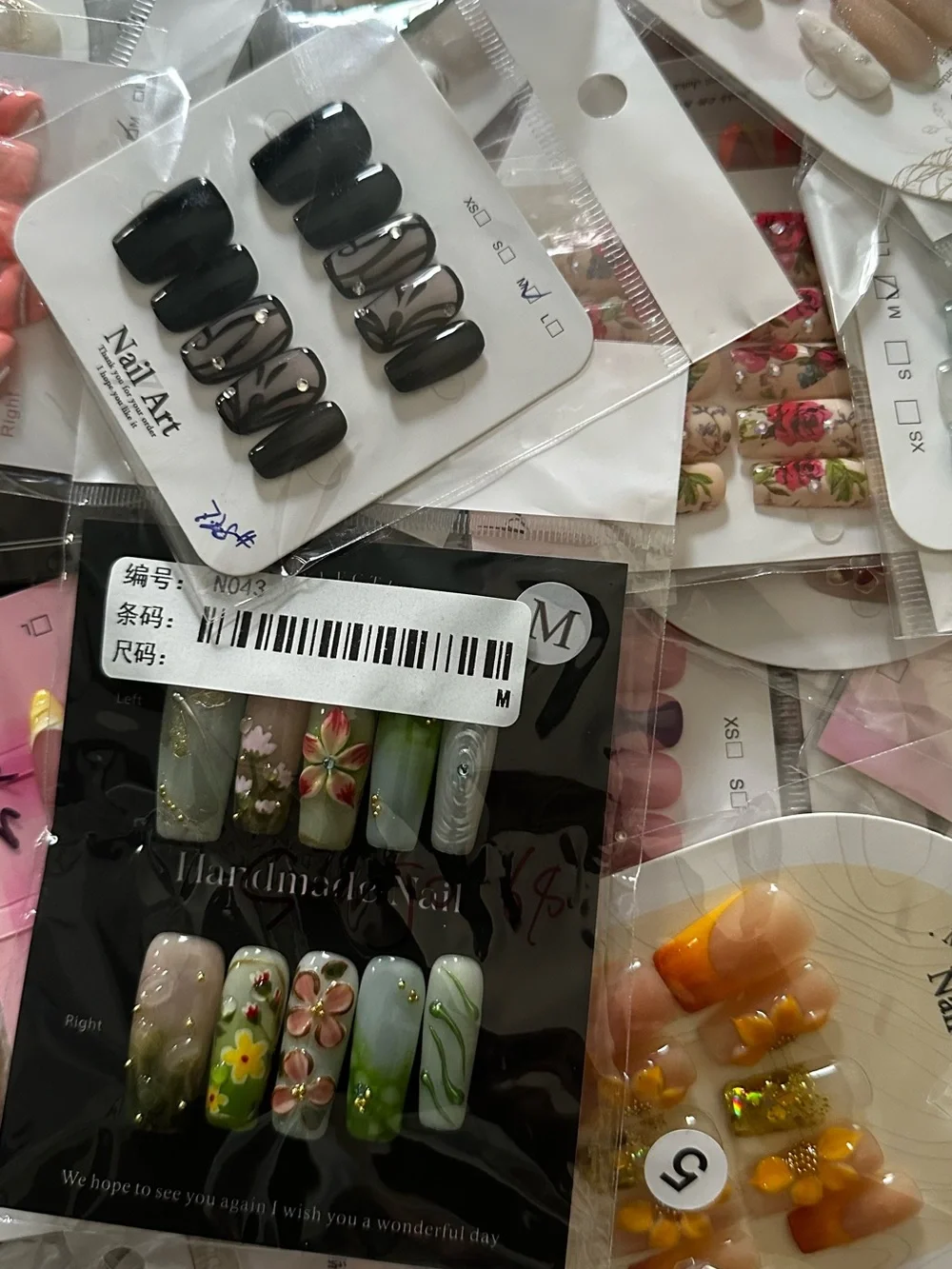 100 Sets of SURPRISE Assorted Press-On Nail Sets - Floral, Pink, Blue, Neutral